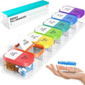 Extra large white and rainbow coloured plastic pill box with 14 removable grid compartments.