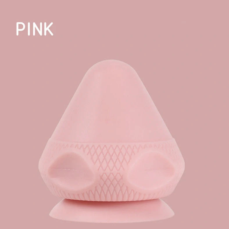 Green silicone massage cone with suction cup, measuring 62mm by 75mm for muscle relief