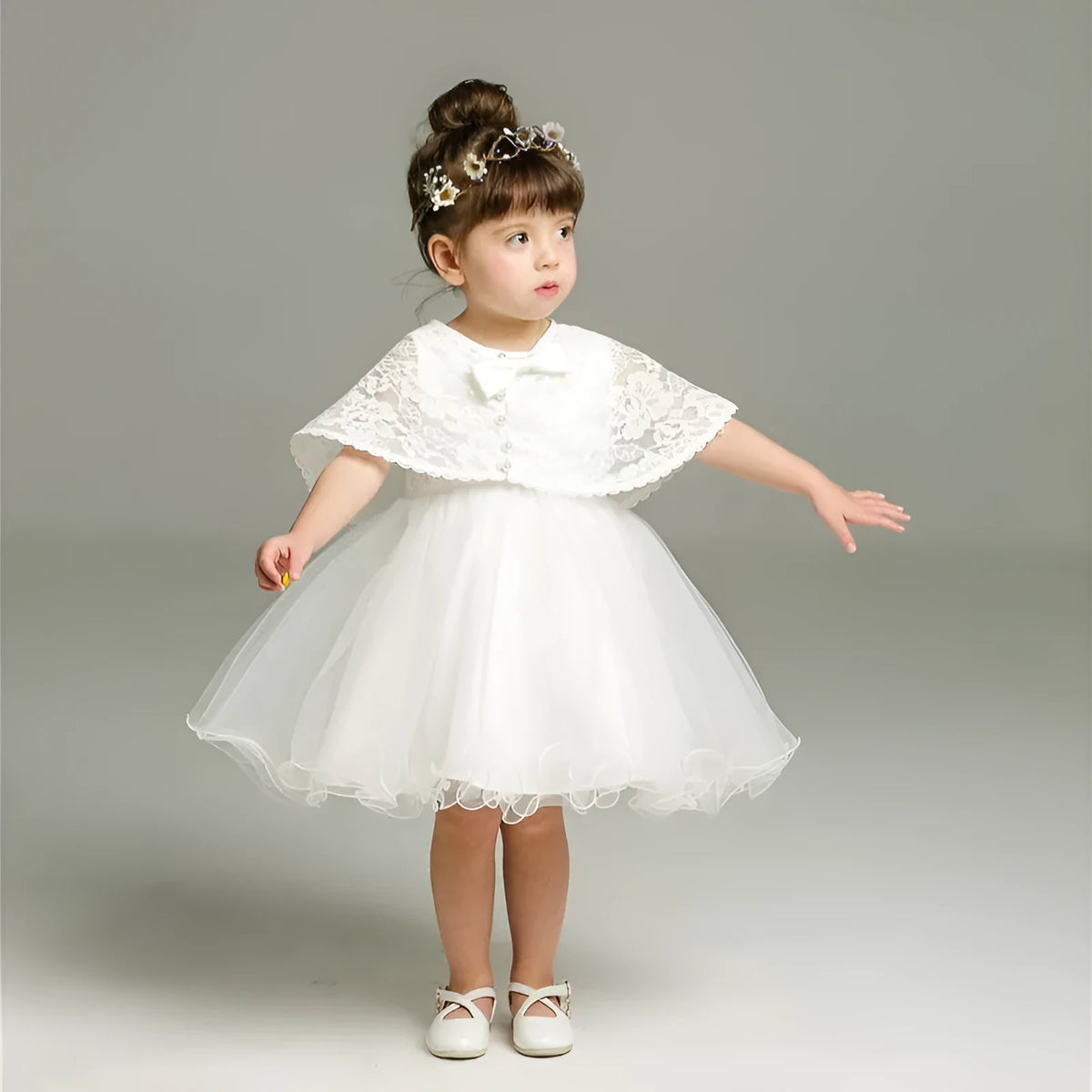 Baby girl fluffy dress two-piece set in beige with soft fabric, displayed on child-sized mannequin