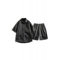 Men's loose grey hemp-blend casual shirt and shorts two-piece set on a hanger