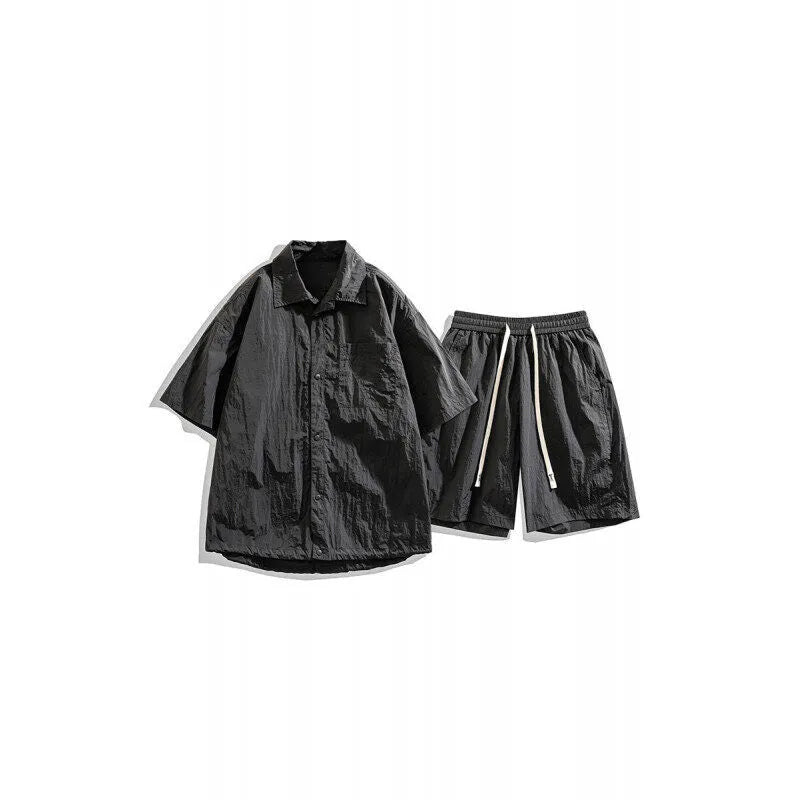 Men's loose grey hemp-blend casual shirt and shorts two-piece set on a hanger