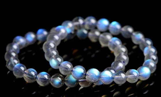 Natural cream body crystal bracelet on wrist showing smooth ground beads.