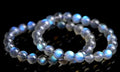 Natural cream body crystal bracelet on wrist showing smooth ground beads.
