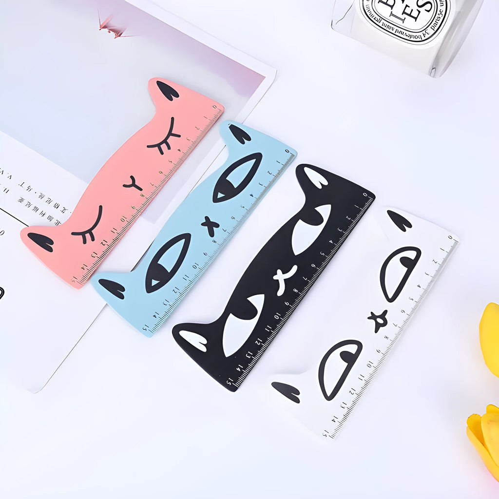 Creative cat-shaped wooden ruler measuring 13 cm in pink colour on white background