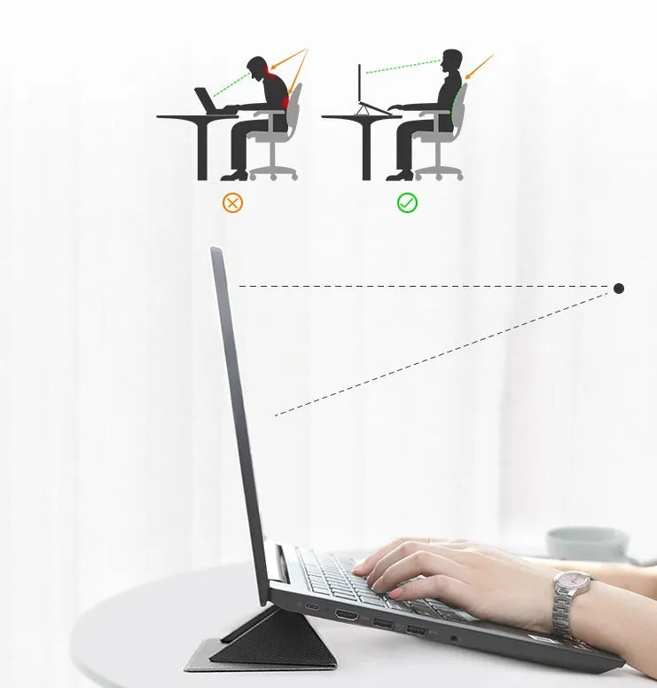 Blue foldable aluminium laptop cooling bracket open on a desk next to a laptop.
