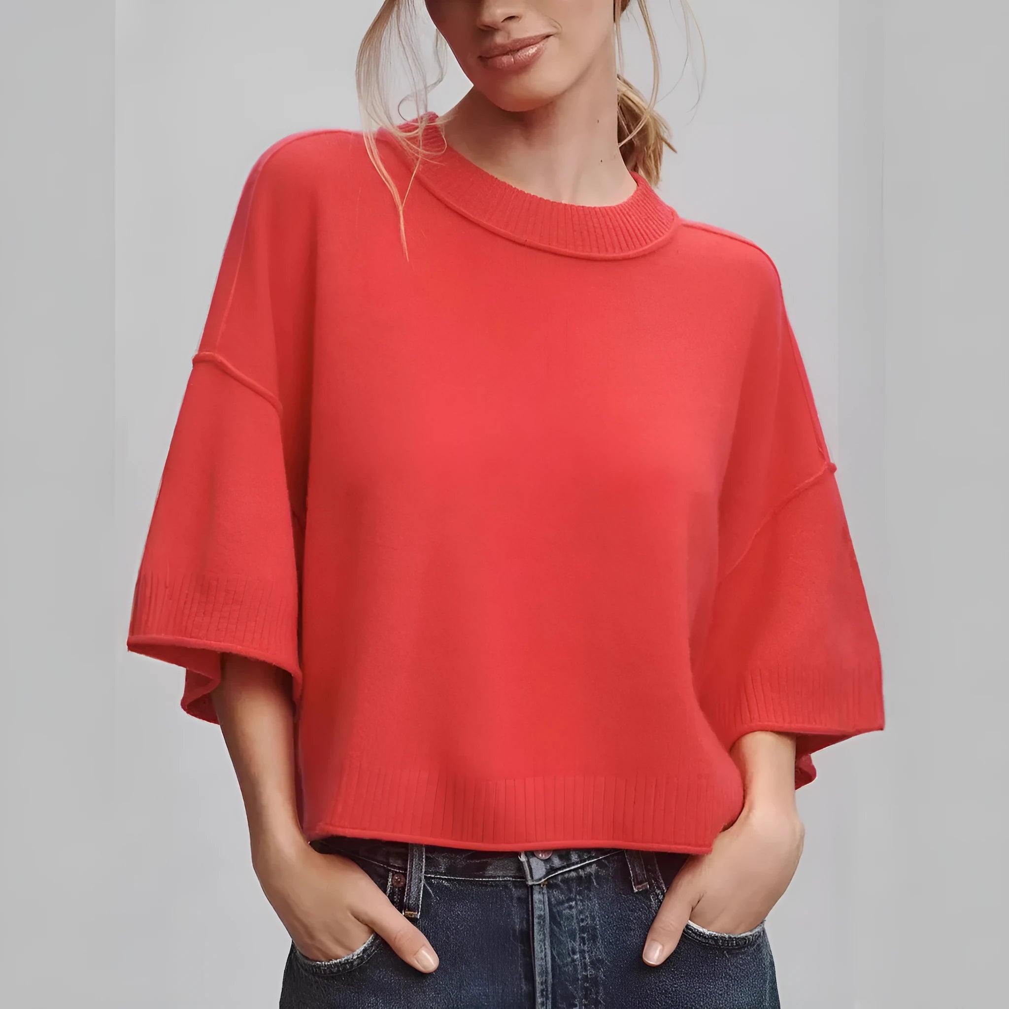 Red viscose short T-shirt with an exposed navel design on a mannequin, front view.