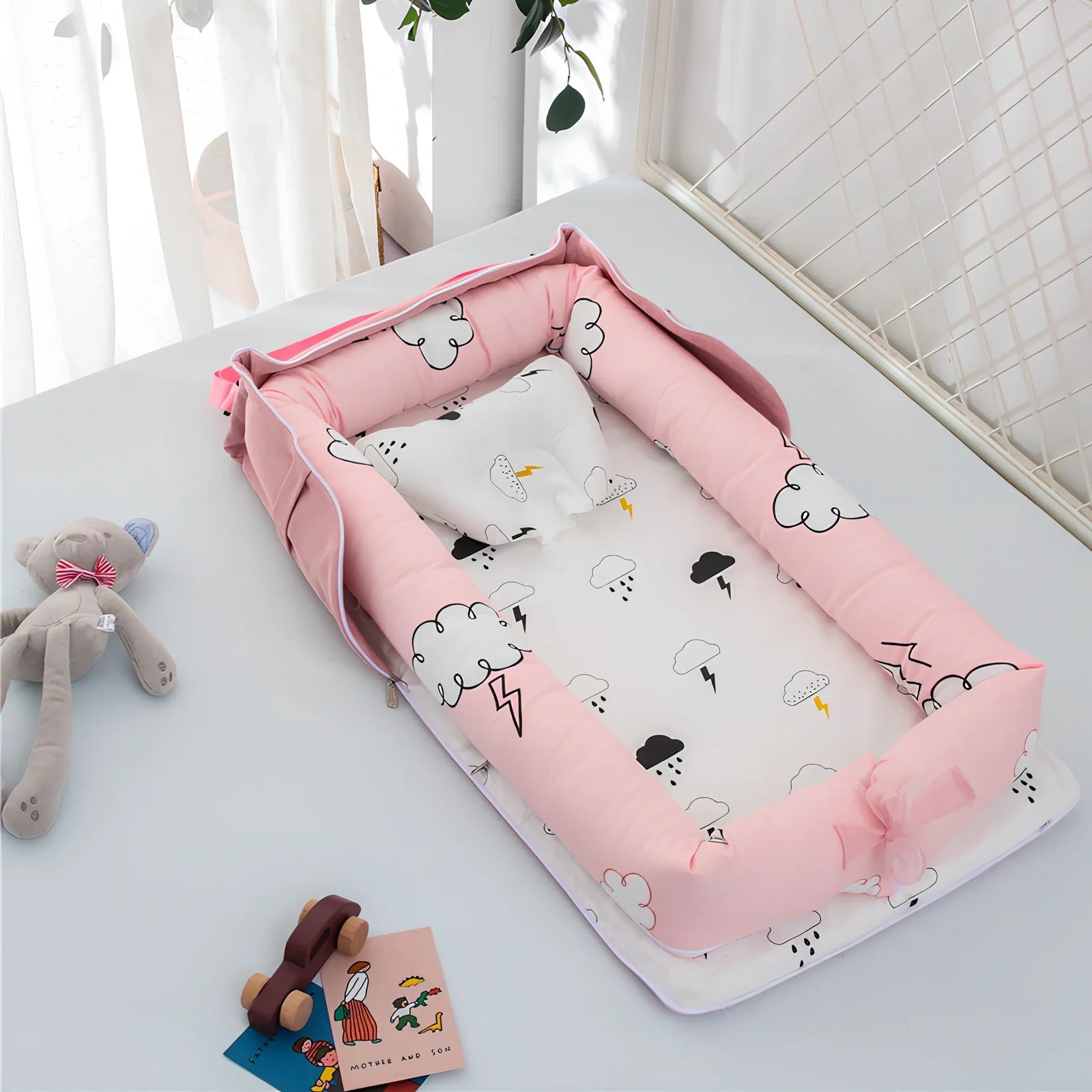 Foldable cotton portable baby crib in Animal World Blue, 90x50 cm with pillow and strap, weighing 1.3 kg