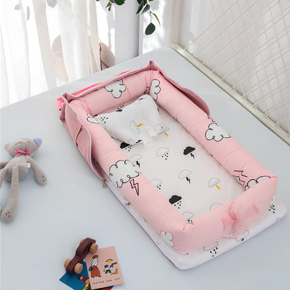 Foldable cotton portable baby crib in Animal World Blue, 90x50 cm with pillow and strap, weighing 1.3 kg