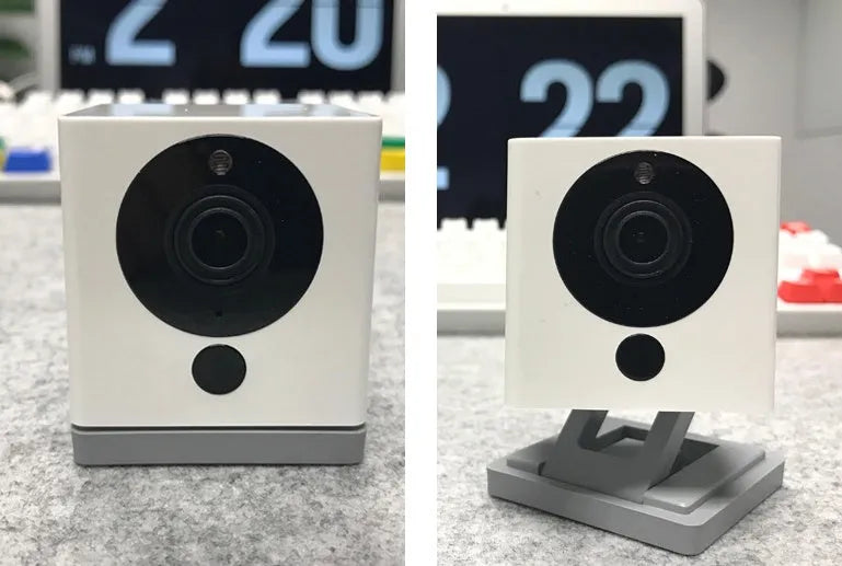 Small white 1080P Wi-Fi indoor security camera with wide-angle lens and night vision
