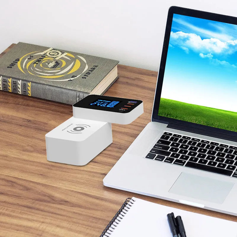 White multi USB port fast wall charger with integrated 10W wireless charging pad and UK, EU, US travel plug adapters
