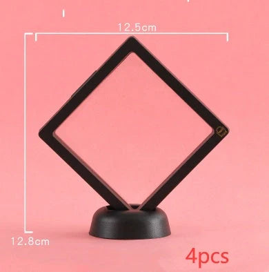 3D floating jewelry display stand showcasing earrings and coins in mid-air