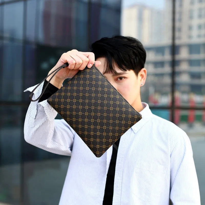 Men's clutch bag in gingham check pattern with soft PU leather, horizontal square shape, and shoulder strap