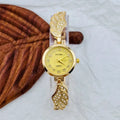 Stainless steel women's watch with round dial on a metal strap with Vachette clasp, shown in gold colour.