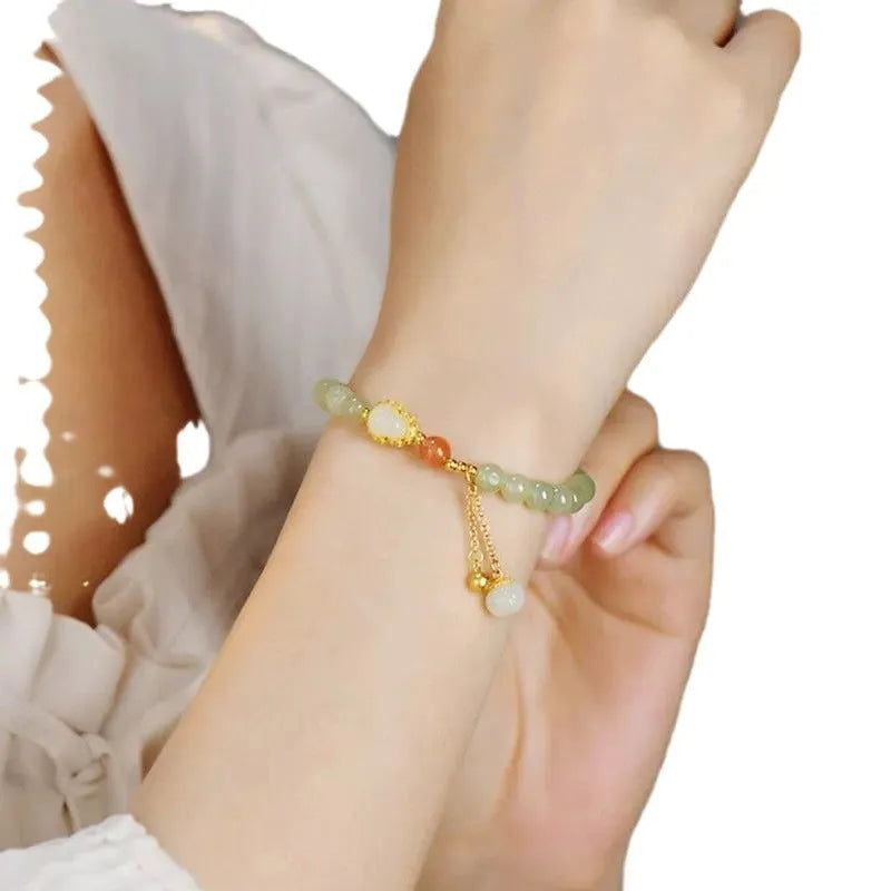 Jade women's bracelet with gold gourd sense design and fu character symbol, 6mm gold plated finish