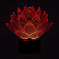 White acrylic lotus-shaped LED night light with touch control on a wooden surface