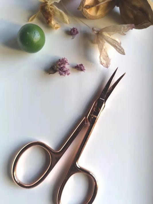 Rose gold metal scissors with sharp blades for precise cutting, 20cm length