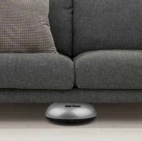 Silver automatic floor sweeping robot with compact 18x18x8cm dimensions