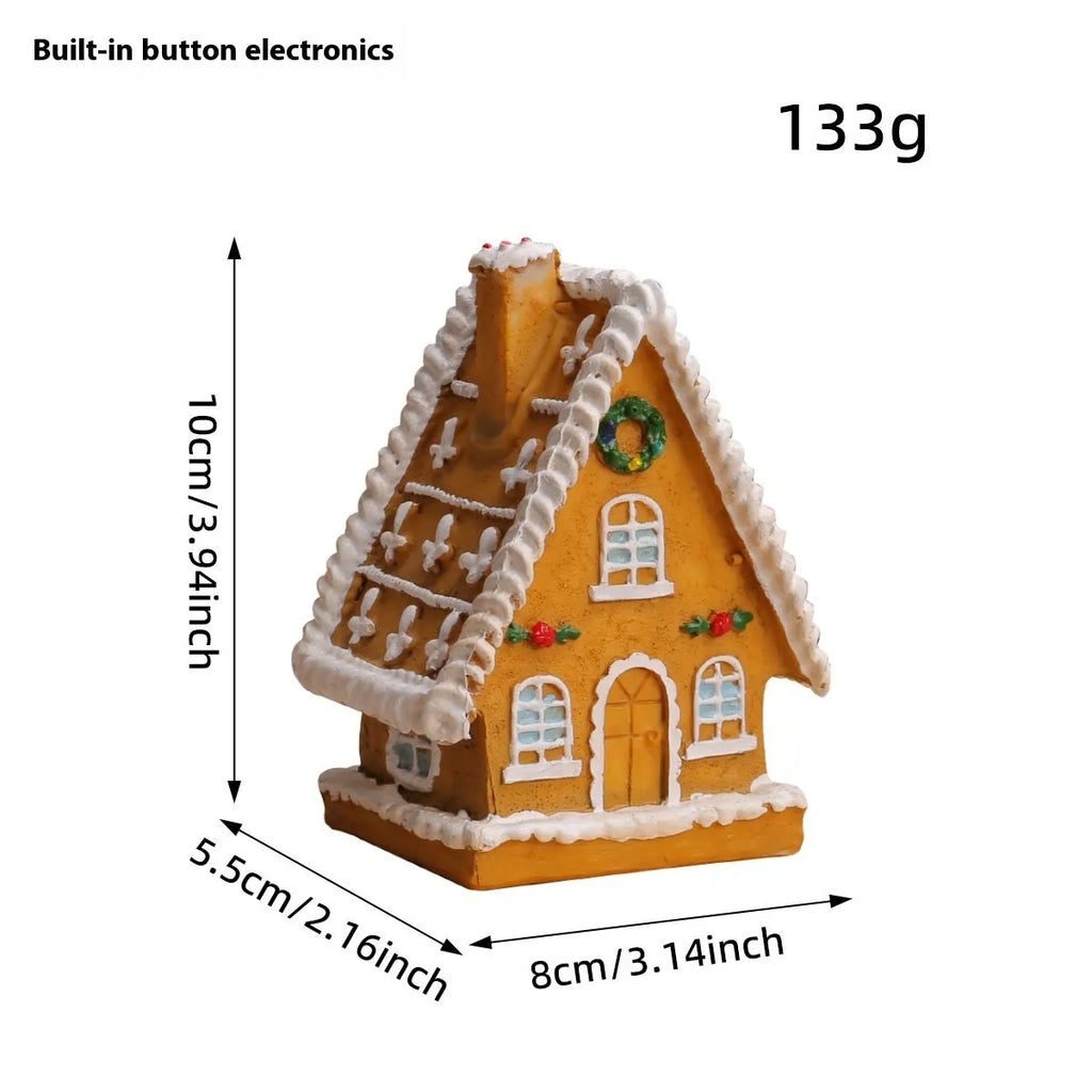 Christmas resin small house micro landscape with warm LED glow on tabletop