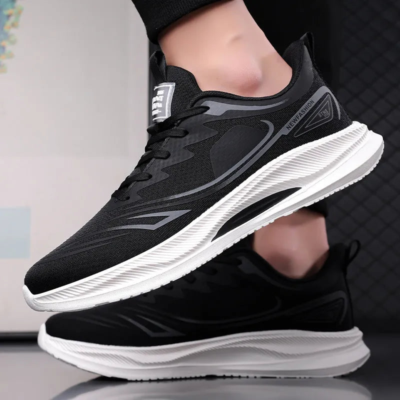 Men's black low-top casual trainers with a woven mesh upper and white rubber sole.