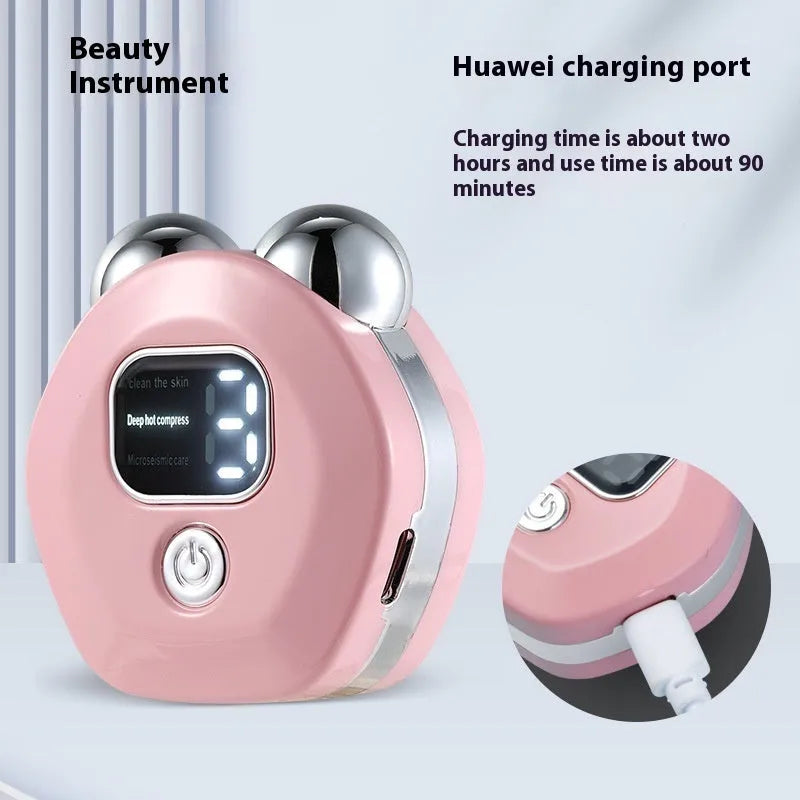 Portable white micro current double-roller facial massage instrument with hot compress function and USB charging cable.