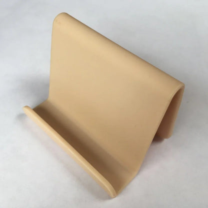 Candy colour plastic phone holder showing 6cm width and 4.5cm height dimensions