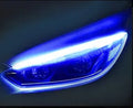 Flexible silicone LED car light strip for daytime running and turn signals, showing wiring connections.