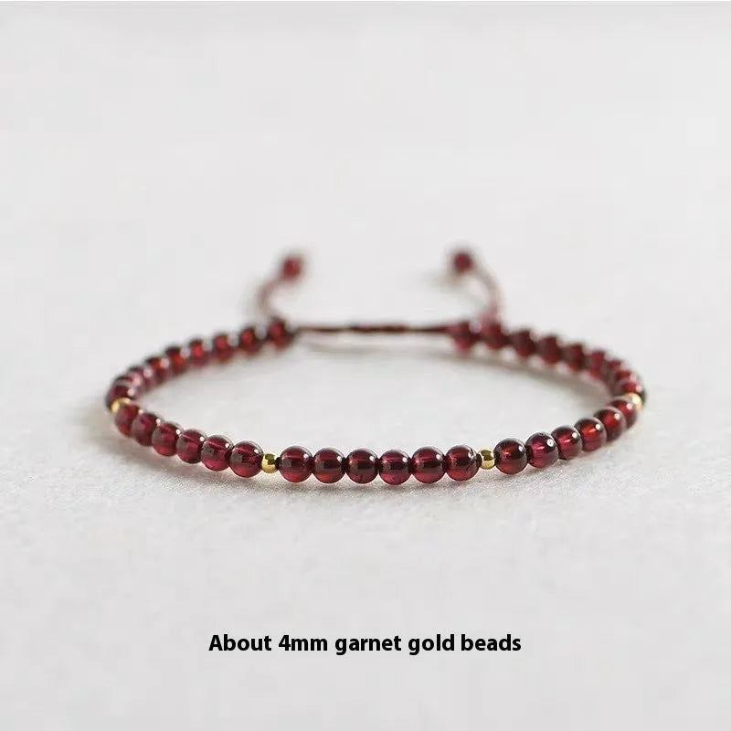 Hand-woven Chinese garnet bracelet with red rope and flexible wire