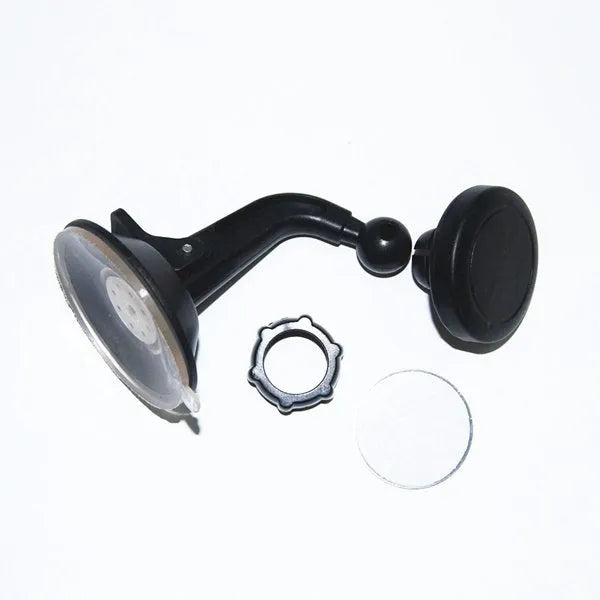 Black magnetic car phone holder mounted on dashboard with phone attached, showing 360-degree rotation capability