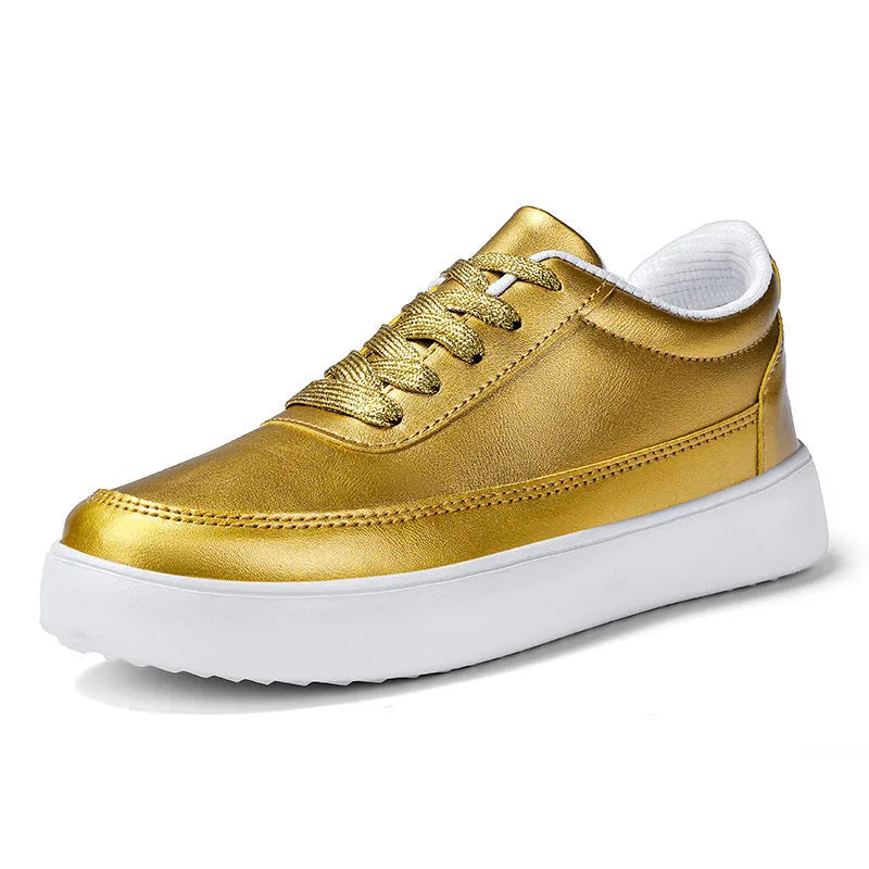 Women's white leather casual flat shoes with front lace-up design on a plain background.