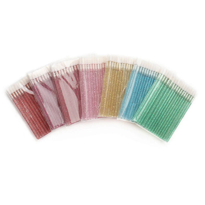 Crystal rod lip brush with synthetic fibre bristles in six colour options on white background