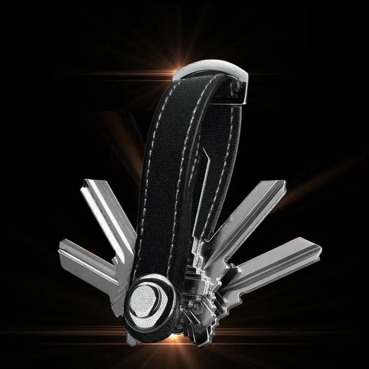 Creative folding key holder in metal copper chrome and cowhide, showing two keyposts and non-slip silicone pad, 85mm length