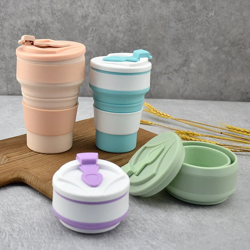 Collapsible silicone travel mug with leak-proof cover in various colours