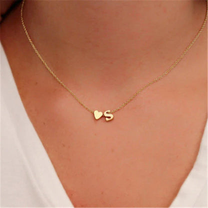 Heart-shaped letter pendant necklace with clavicle chain design in gold and silver tones