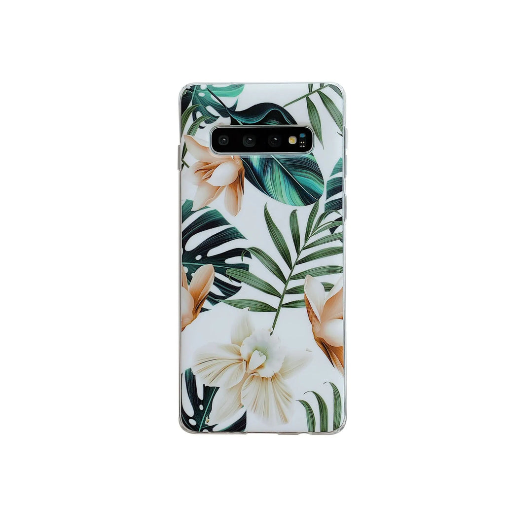 Green leaf flower patterned TPU phone case for Samsung Galaxy phones on a table.