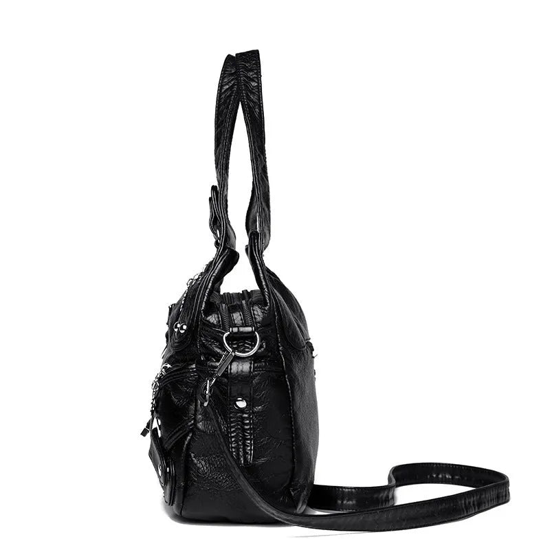 Women's large capacity washed leather handbag in soft PU, black colour, with slit pocket and sewn thread detailing