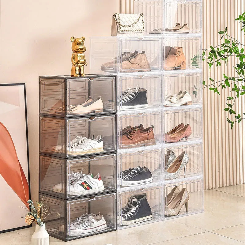 Transparent acrylic shoe storage box with magnetic side door showing shoe inside