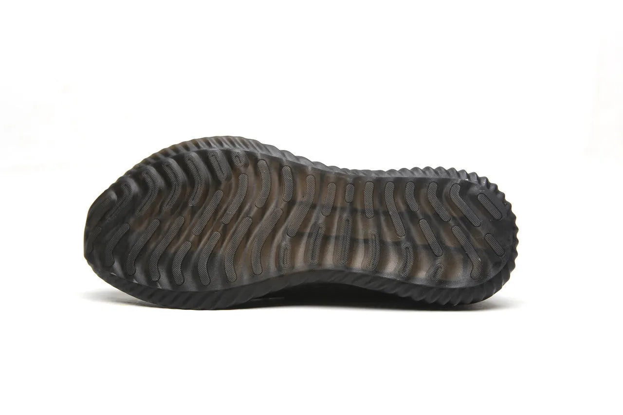 Black steel toe cap safety shoes with low-cut design on a work site background.