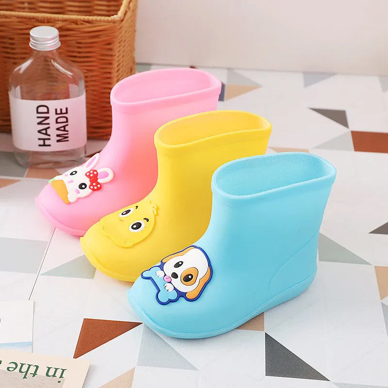 Children's short non-slip waterproof PVC rain boots in cartoon colours, yellow pink and blue options