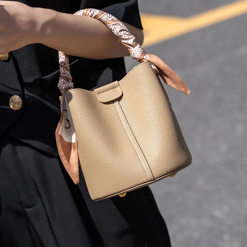 PU leather casual handbag for women with bow detail in golden brown