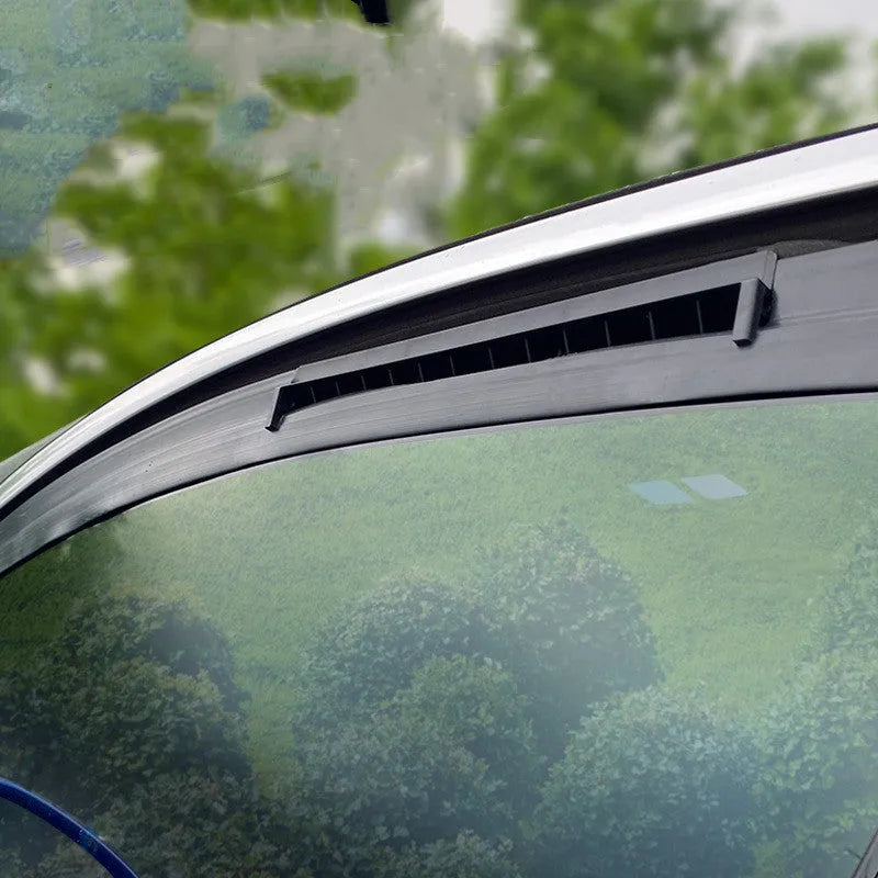 Black and white USB car ventilation fan for exhaust odour reduction, approx. 23cm long.