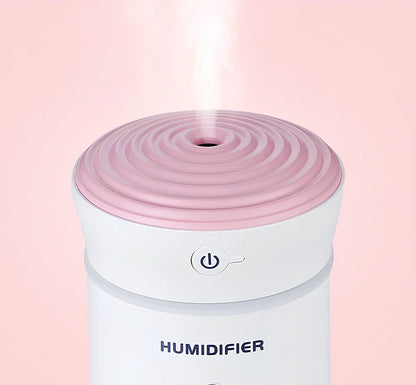 Creative car air purifier humidifier in pink, 7.6x7.6x17cm size with 300ml bottle and USB cable