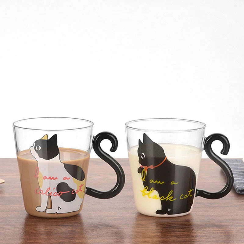 Adorable cat-themed glass mug with tail-shaped handle, perfect for hot and cold beverages