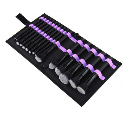 Black 15-piece makeup brush set with wooden handles and folding cloth storage bag
