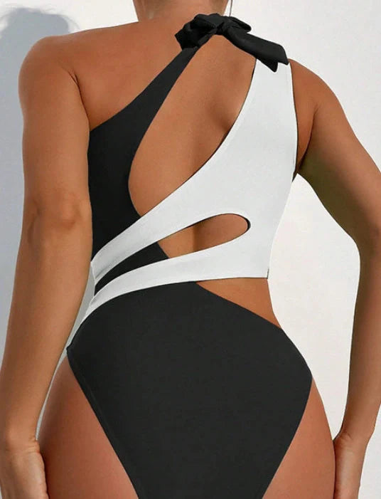 Women's black one-piece swimsuit with cross-colour lace-up front design for adjustable fit during swimming