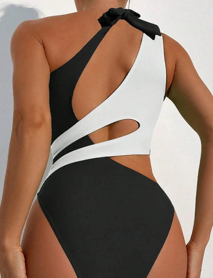 Women's black one-piece swimsuit with cross-colour lace-up front design for adjustable fit during swimming