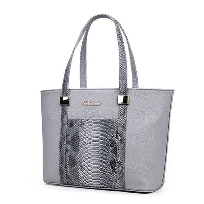 Elegant women's shoulder bag with zipper and organised pocket in light grey, black, off-white, and rose red