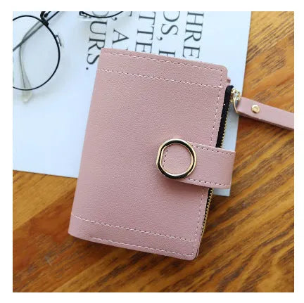 Women's PU leather buckle ring wallet in compact 12x9cm size with card slots and coin section.