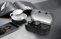 Black TWS wireless sports earbuds displayed next to their compact mini charging case.