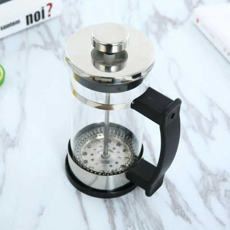 Glass and stainless steel pour-over coffee maker with 350ml capacity measuring 10x8x17cm