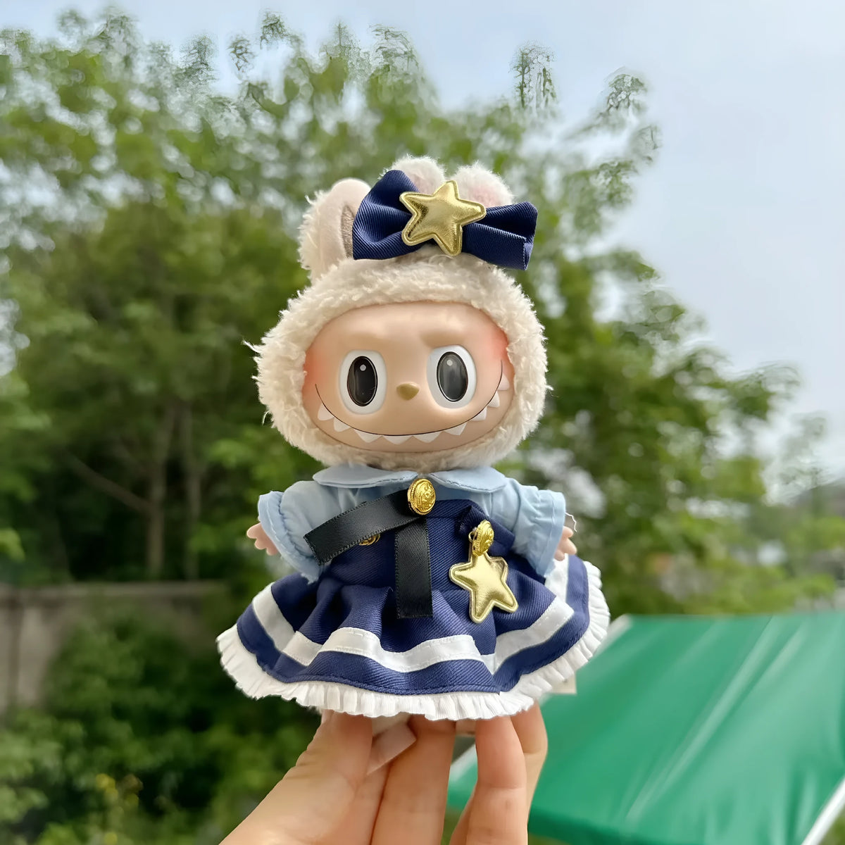15cm doll clothes pendant in plush fabric, removable and washable, featuring a themed suit design for small dolls